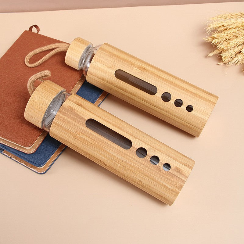 Foreign trade bamboo shell glass cup high temperature resistant high borosilicate single layer glass water bottle creative bamboo anti-scalding handle glass cup