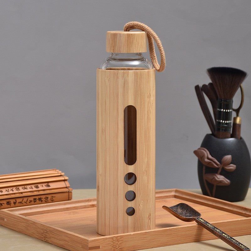 Foreign trade bamboo shell glass cup high temperature resistant high borosilicate single layer glass water bottle creative bamboo anti-scalding handle glass cup