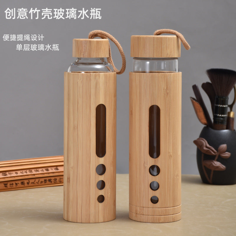 Foreign trade bamboo shell glass cup high temperature resistant high borosilicate single layer glass water bottle creative bamboo anti-scalding handle glass cup
