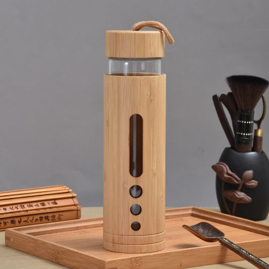 Foreign trade bamboo shell glass cup high temperature resistant high borosilicate single layer glass water bottle creative bamboo anti-scalding handle glass cup